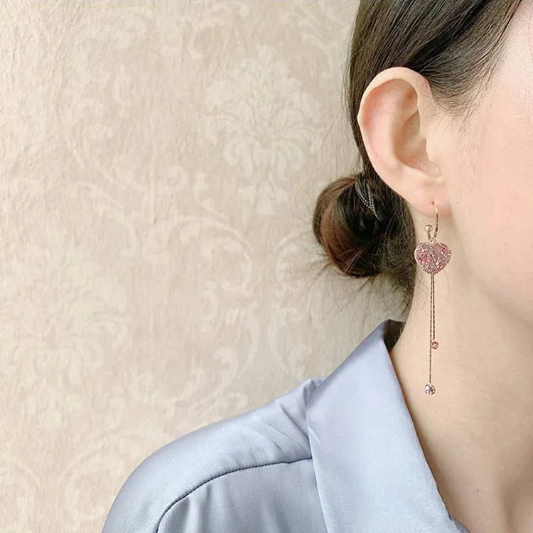 Pink heart shaped tassel earrings with frosty finish on alloy base
