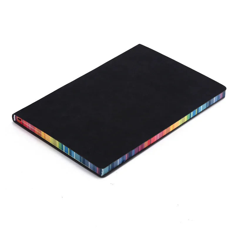 A5 rainbow side PU leather cover notebook open on a desk, showing lock line hardcover binding and 100g Daolin paper pages