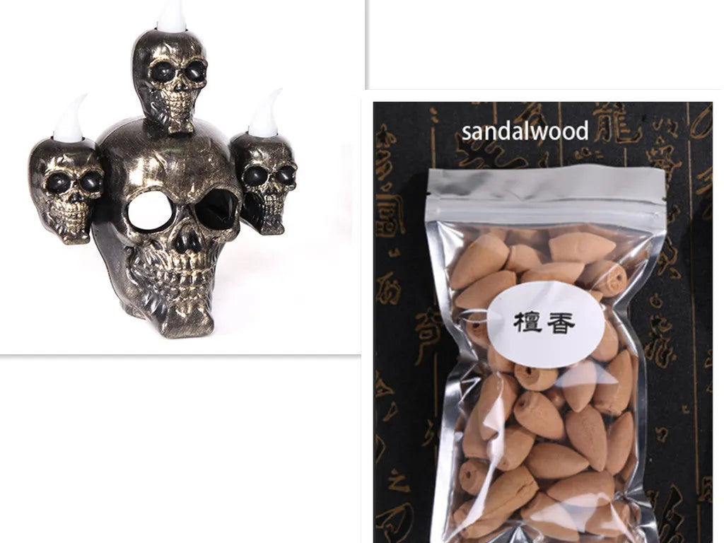 Halloween skull ornament with LED light, gold and silver, plastic, 14x12x9cm, on dark background