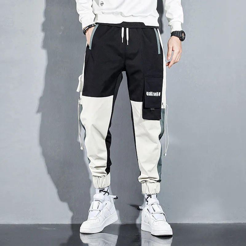 Men's polyester drawstring casual pants, K91 regular fit, blue colour, side view showing waist and leg
