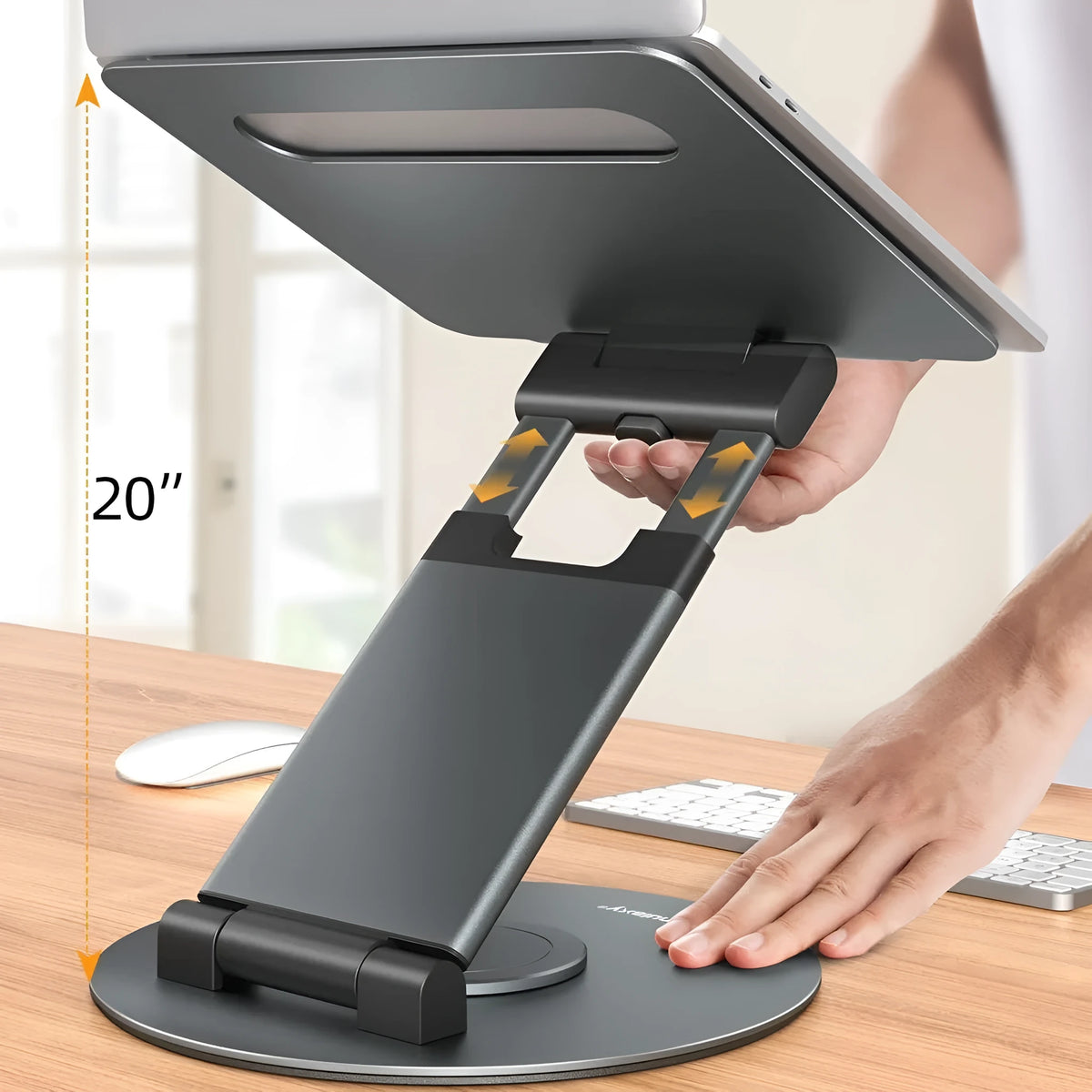 Aluminium alloy laptop bracket on desk with 360-degree rotating base and lifting mechanism