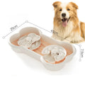 Large green slow feeder dog bowl with three separable puzzle trays and non-slip suction cups on base.