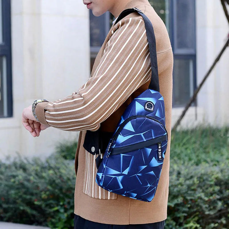 Print sling chest bag with earphone hole design in Oxford cloth, showing zipper opening and square vertical shape