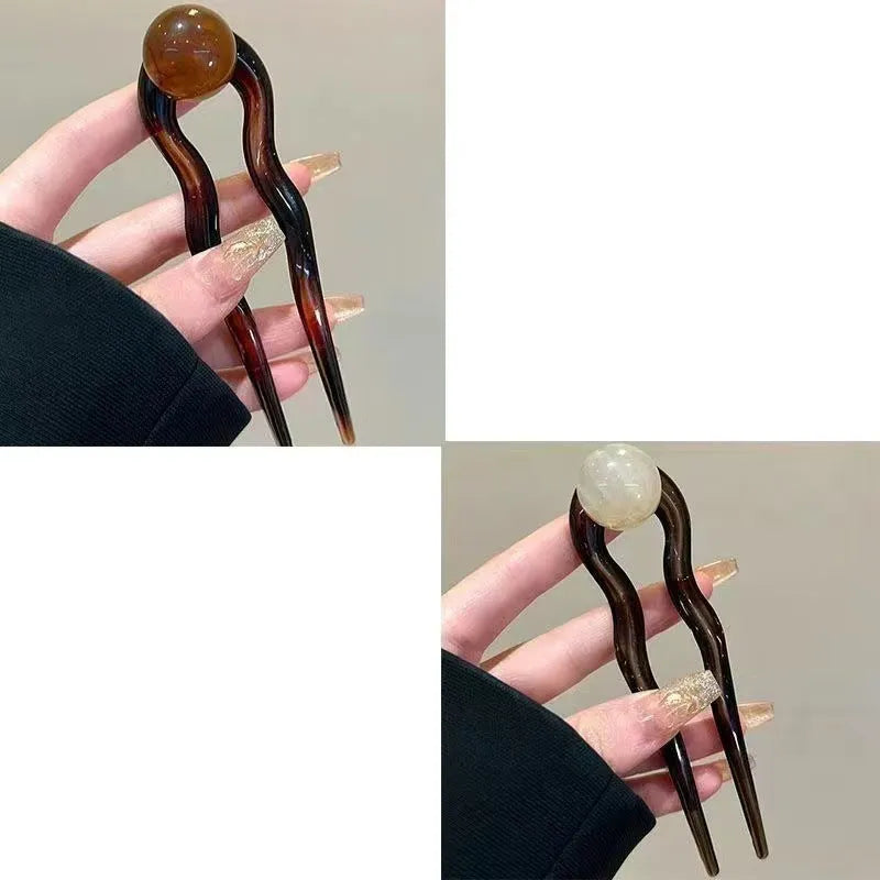 Simple U-shaped acrylic barrettes with ball retro design in beige, caramel, dark gray and green colours