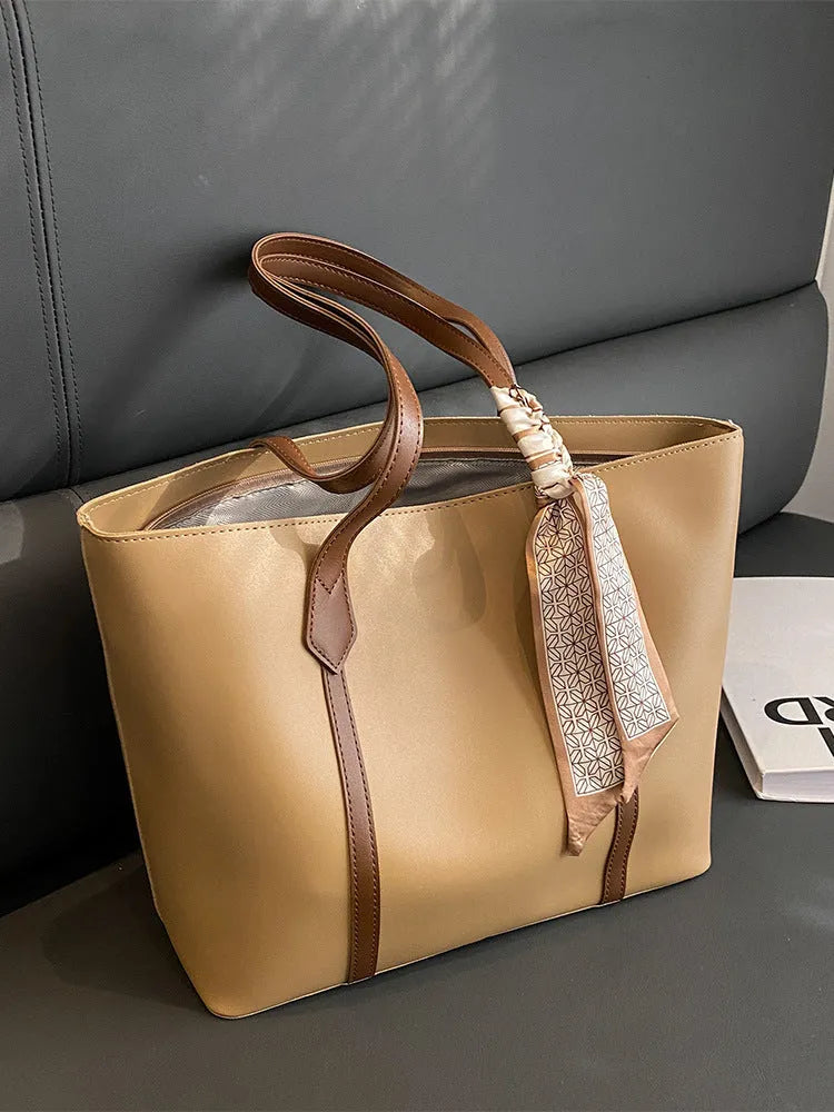Large capacity bucket-style tote bag in multiple colour options with sandwich pocket exterior