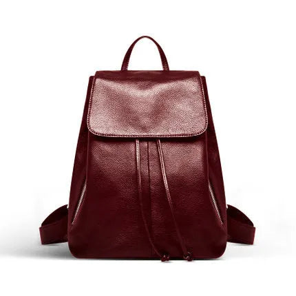 Black genuine leather women's backpack with multiple compartments and street style design