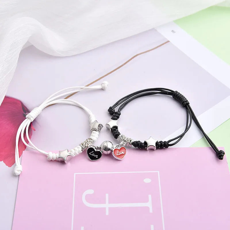 Magnet couple bracelets with electroplated finish showing magnetic clasp and symbolic design options