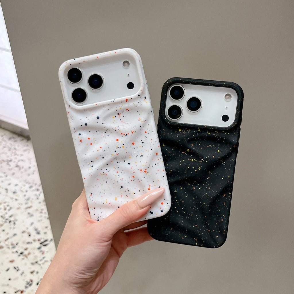 TPU phone case with splash ink pattern in black fitted on an iPhone showing the camera cutout