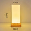 Nordic style wooden USB table lamp with flower-shaped base and cylindrical lamp head