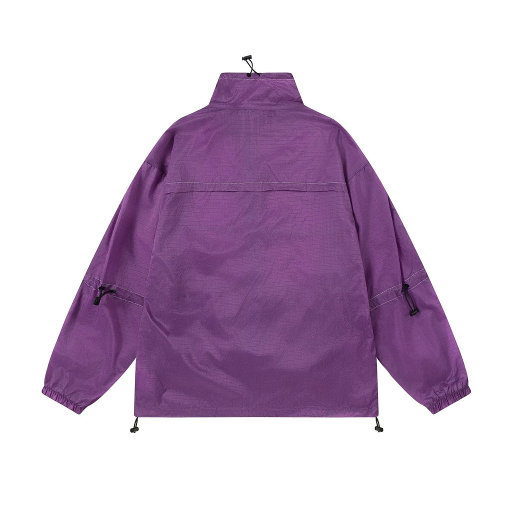 Men's thin loose sun protection jacket in black nylon fabric with pockets, worn casually outdoors