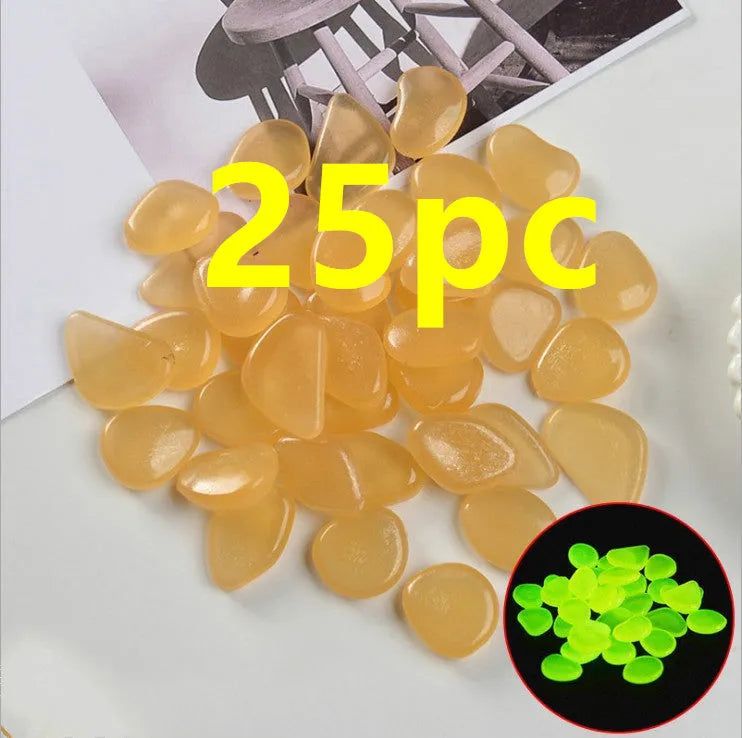 Luminous fluorescent aquarium and garden pebbles in mixed colours including dark purple, yellow, light blue, pink, orange