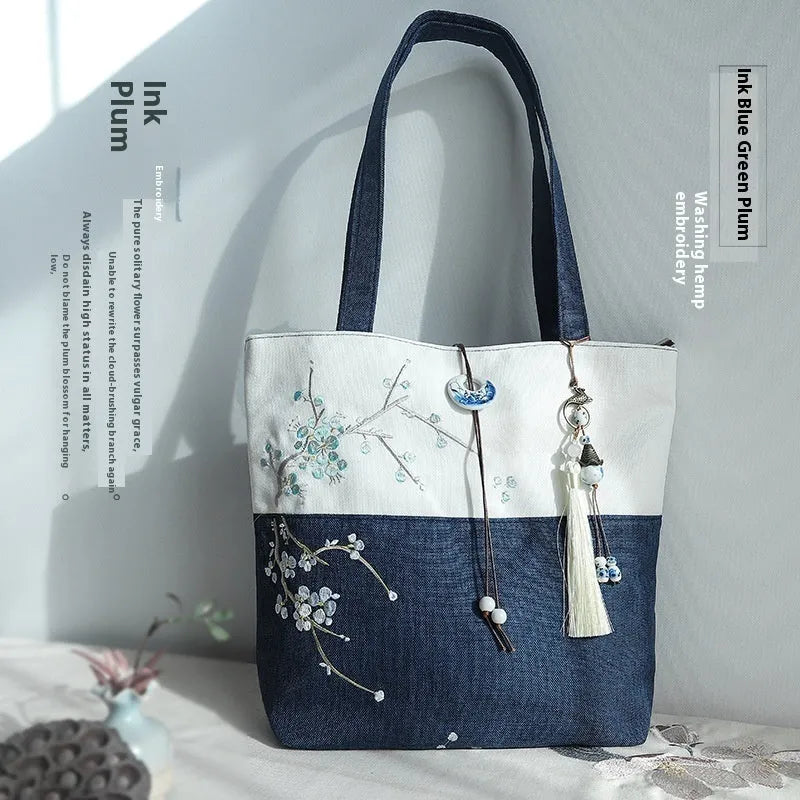 Artistic retro canvas shoulder handbag with hand-painted literary design and copper zipper