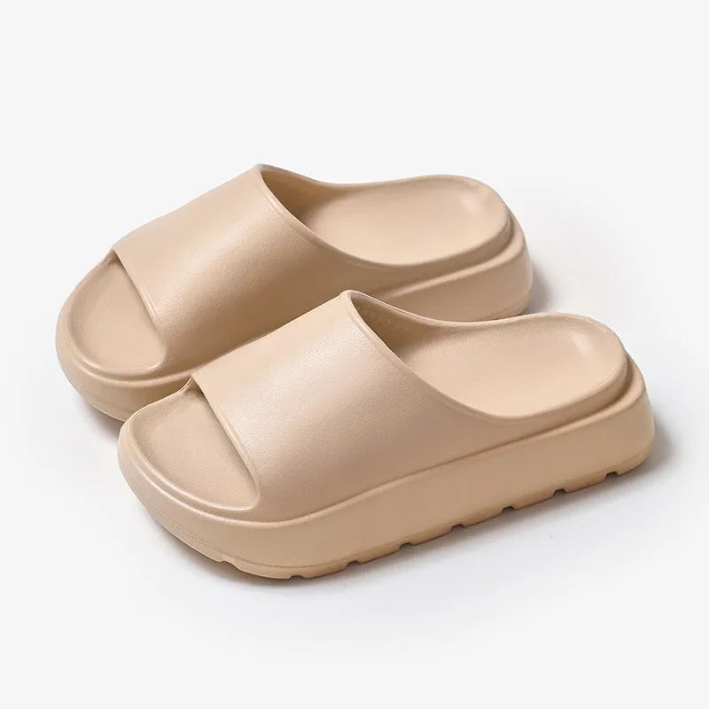 Women's fish mouth slippers with a thick light-coloured sole, shown in a beige colour option.