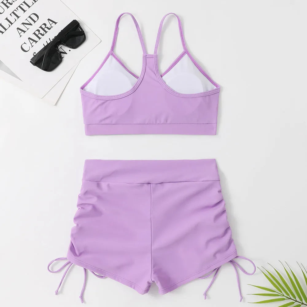 Women's high waist split swimsuit in black or violet with two-piece bikini design for swimming and surfing