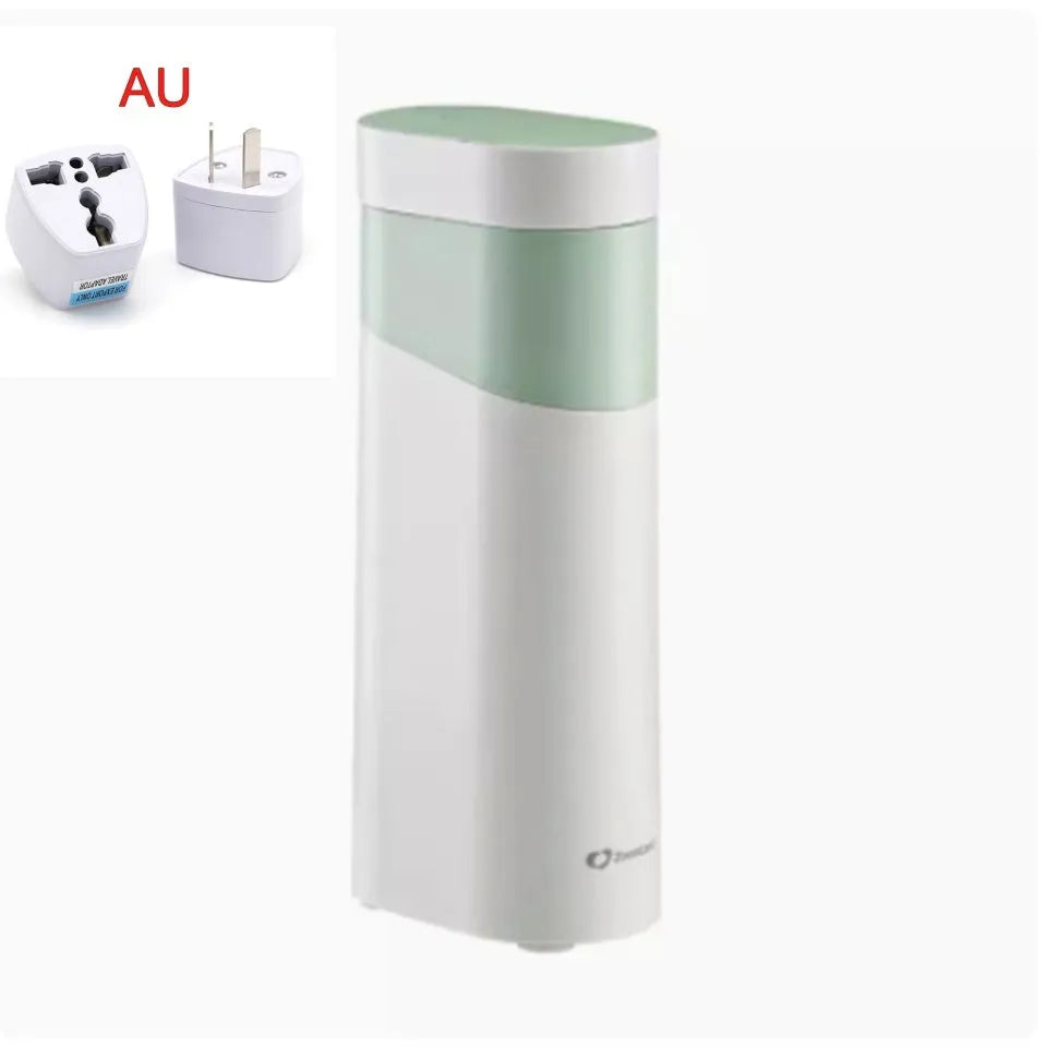 Black portable instant water dispenser with digital display on a wooden desktop.