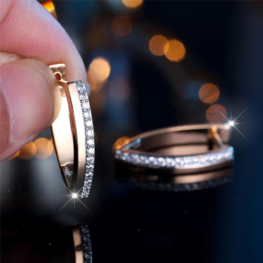 Women's V-shaped electroplated copper ear clips in Champagne Gold and White Diamond geometric design