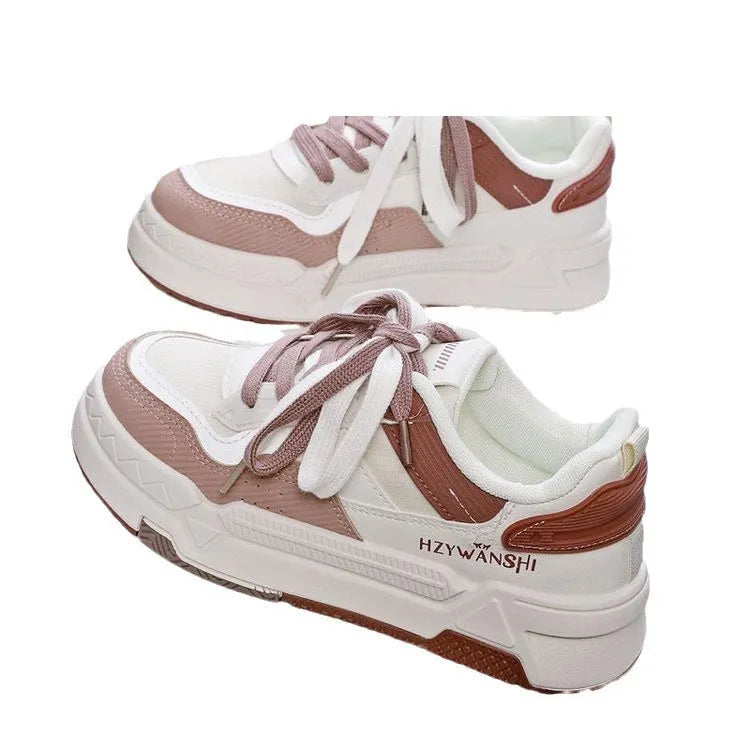 Beige children's lace-up board shoes with cross shoulder straps and a thick rubber sole.