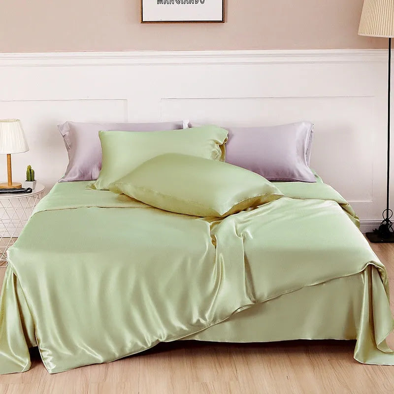 Solid colour silk duvet cover laid flat, showing plain weave texture in a choice of six colours.