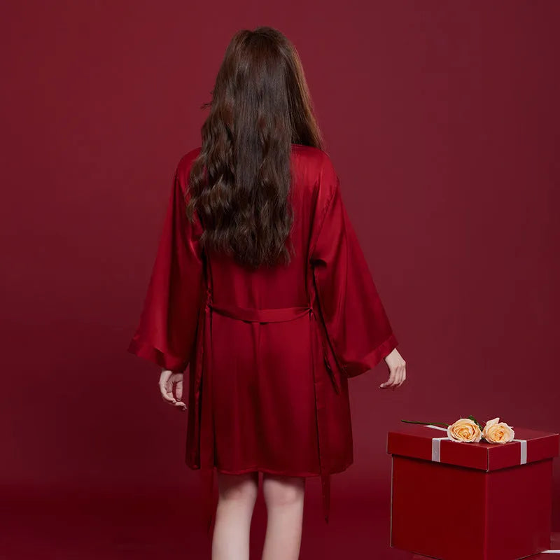 Matching red ice silk polyester sleepwear set for men and women with long sleeves and trousers
