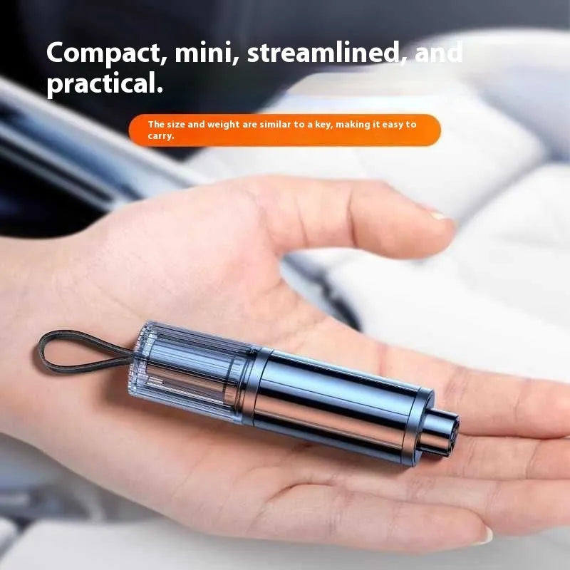 Black and red car safety life hammer with spring-loaded steel tip for emergency window breakage