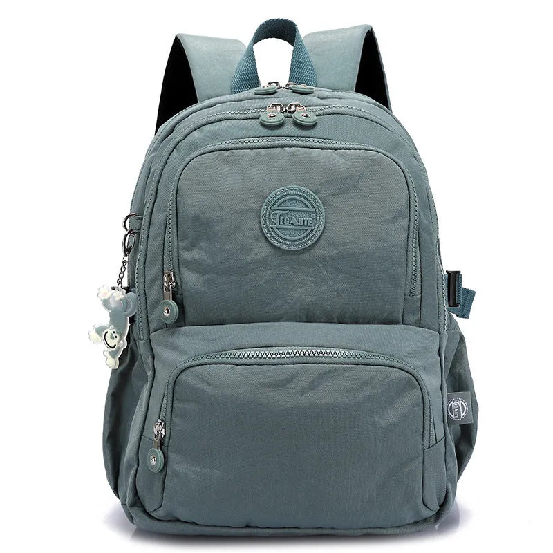 Nylon ultra light outdoor daily travel backpack with curved shoulder straps in olive green colour