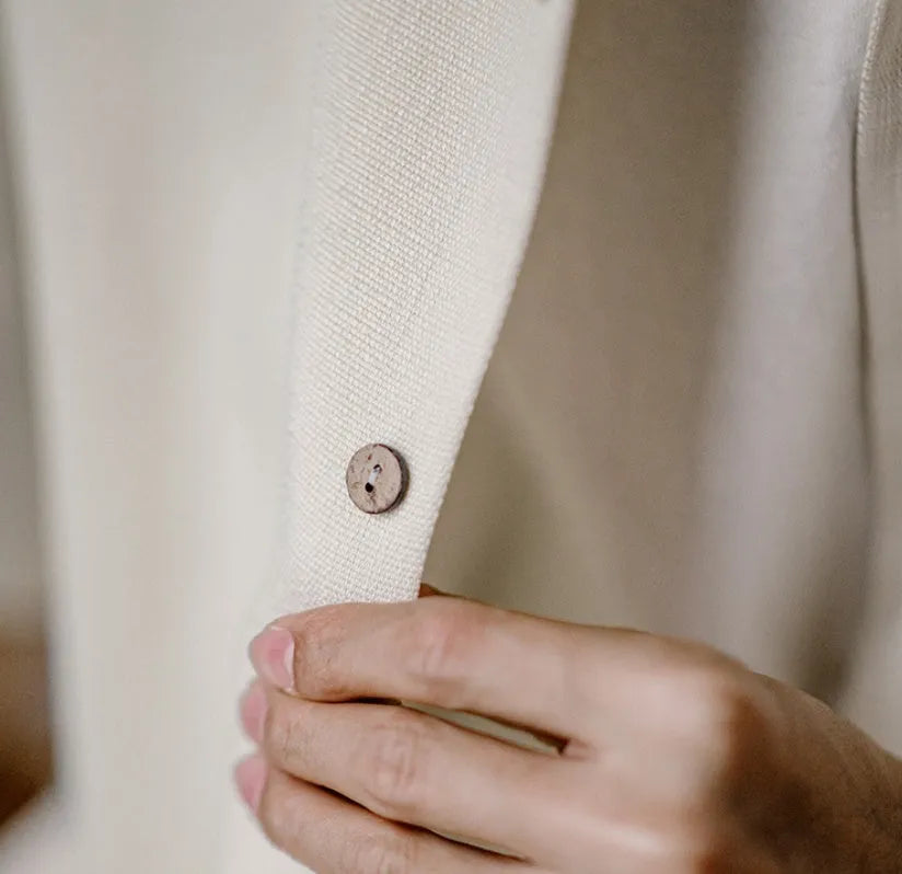 Light apricot men's Cuban collar shirt with bamboo and floral plant pattern.