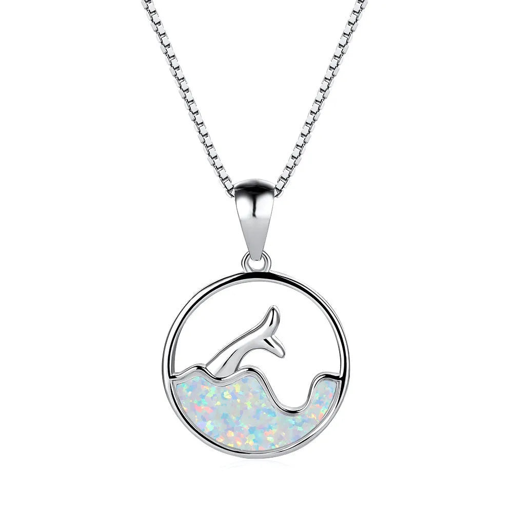 Geometric sea fishtail pendant necklace with electroplated white gold finish and round decorative elements