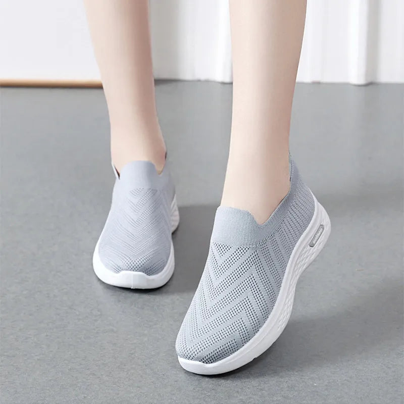 Women's casual mesh slip-on shoes, breathable sock style, soft plastic sole, available in black grey khaki pink