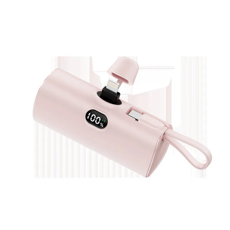 Capsule-shaped digital display power bank with folding plug in multiple colours.