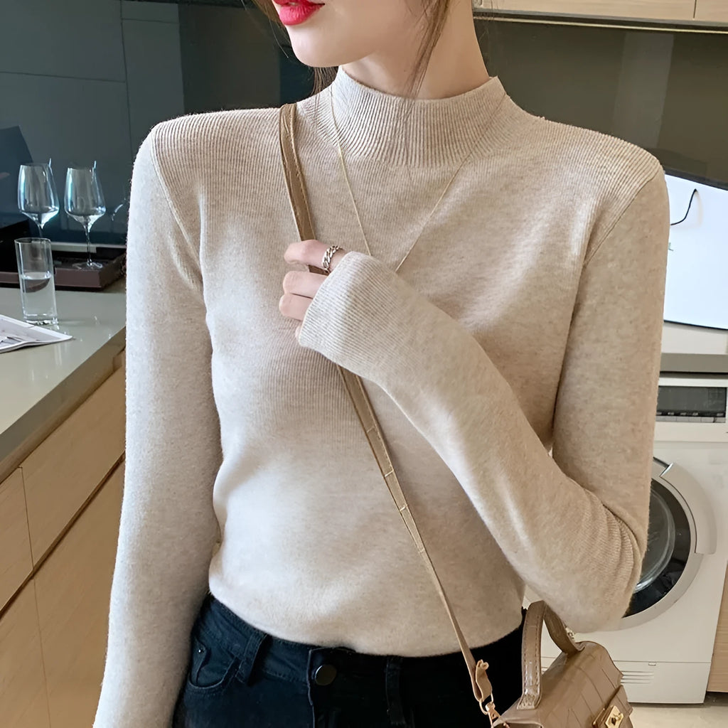 Women's slim fit viscose knitted top in apricot colour with long sleeves