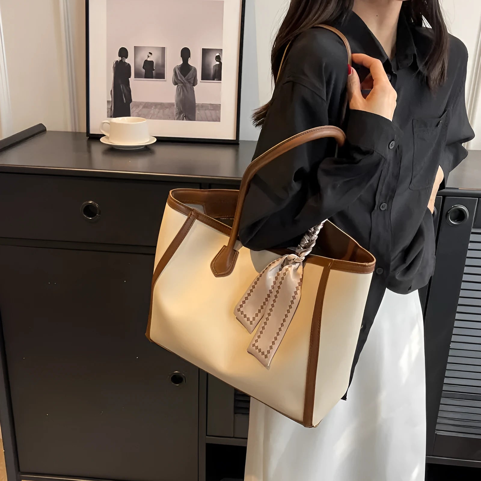 Soft PU commuter shoulder bag showing open pocket, internal phone compartment, and zippered change section