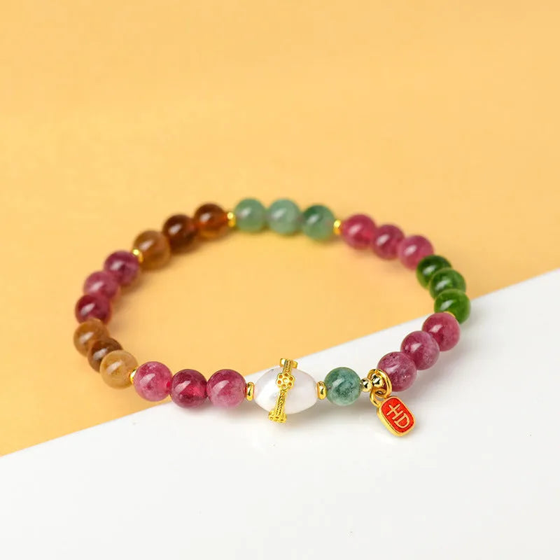 Geometric unisex bracelet made from chalcedony and tourmaline crystals, bead size 6.5mm.