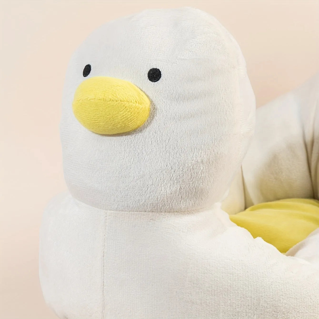 Blue duck-shaped fluffy pet bed for small dogs and cats with unique pattern