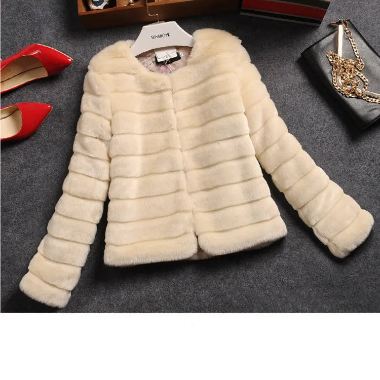 Woman wearing a short white faux fur top with regular sleeves, style suitable for street fashion.