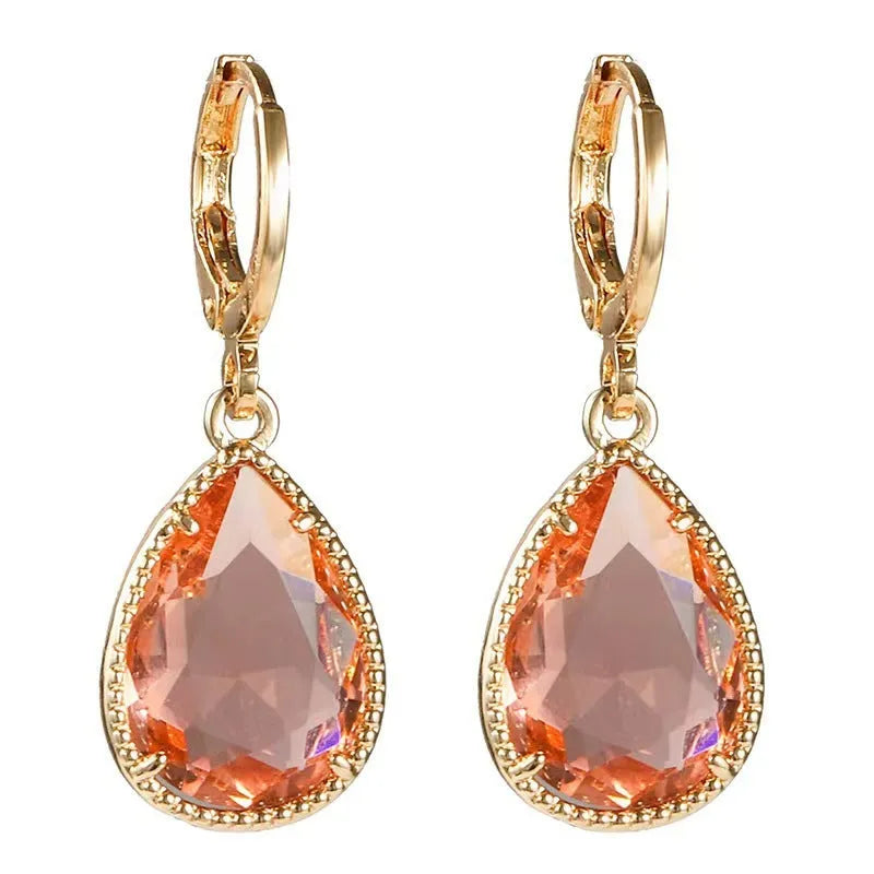 Geometric glass water drop earrings with carved Saturn design in multiple colours