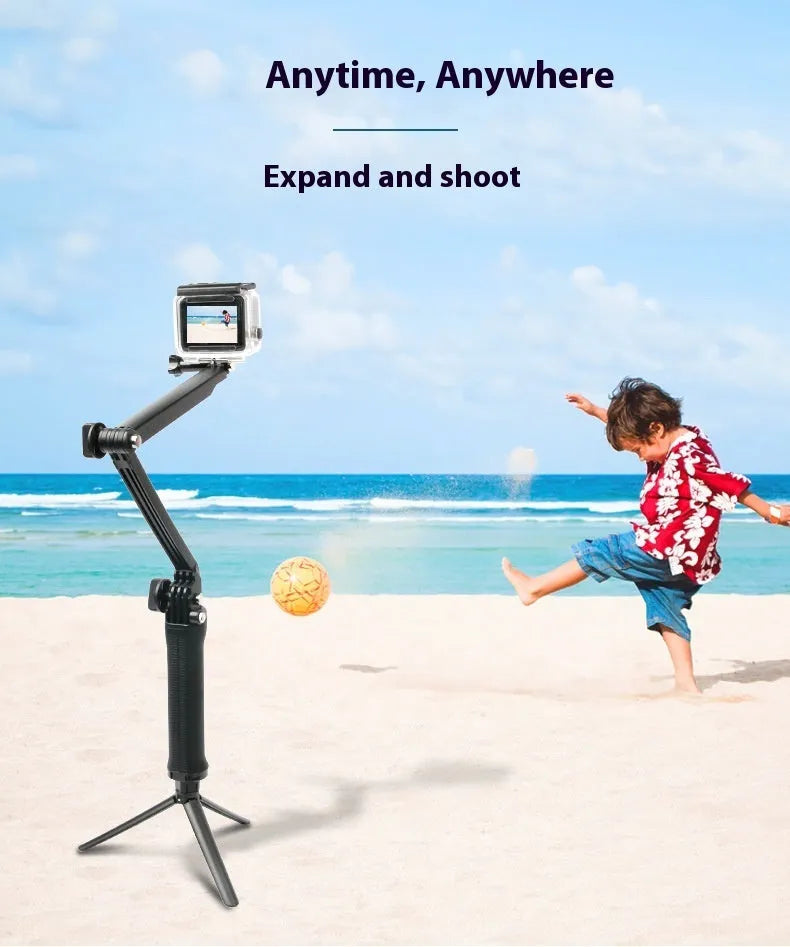 Black portable folding tripod bracket for GoPro Hero action cameras on a flat surface.