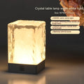 Compact crystal lamp 80x80x12mm with touch sensor and USB cable on a wooden desk