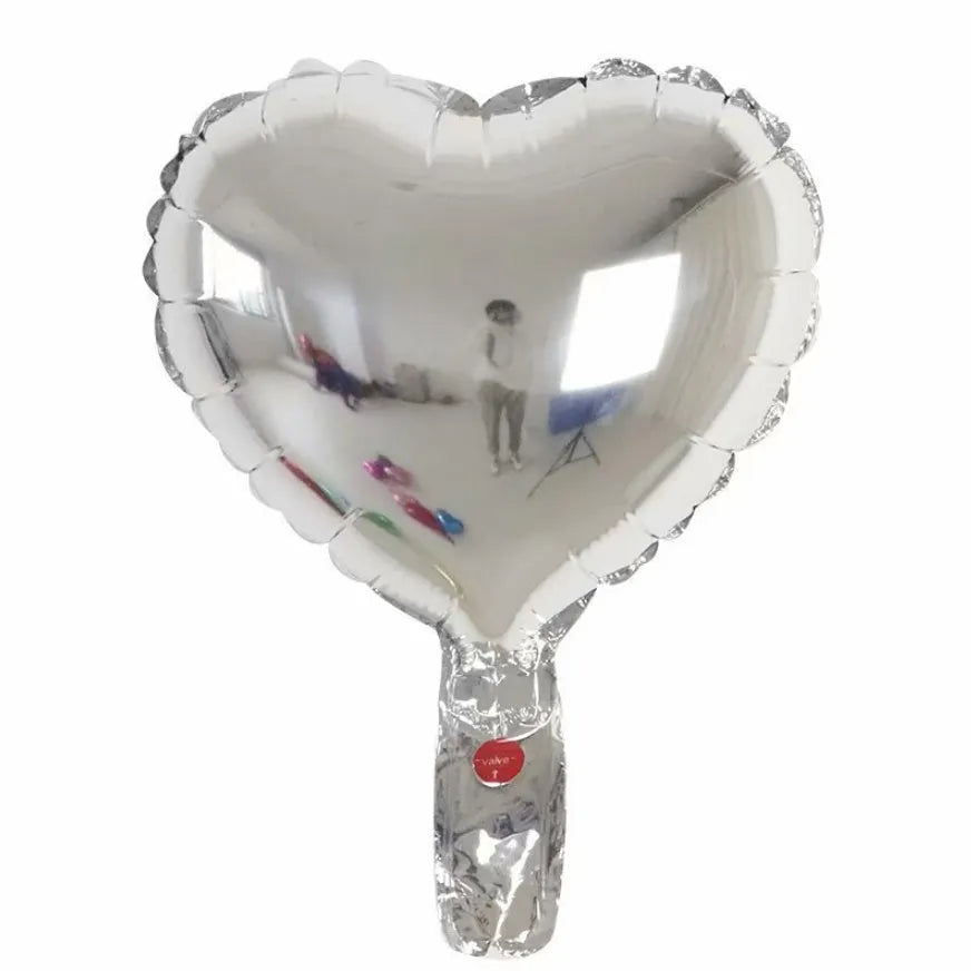 Five peach heart-shaped aluminium foil balloons in metallic colours for party decoration