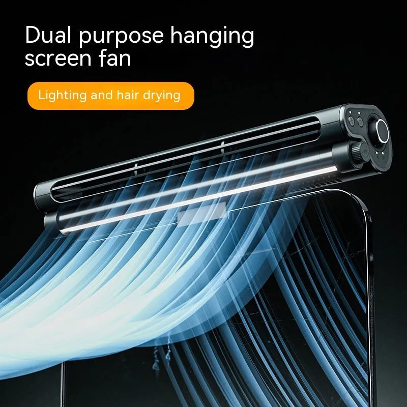 Black USB-powered bladeless fan with integrated lighting lamp clipped to computer screen
