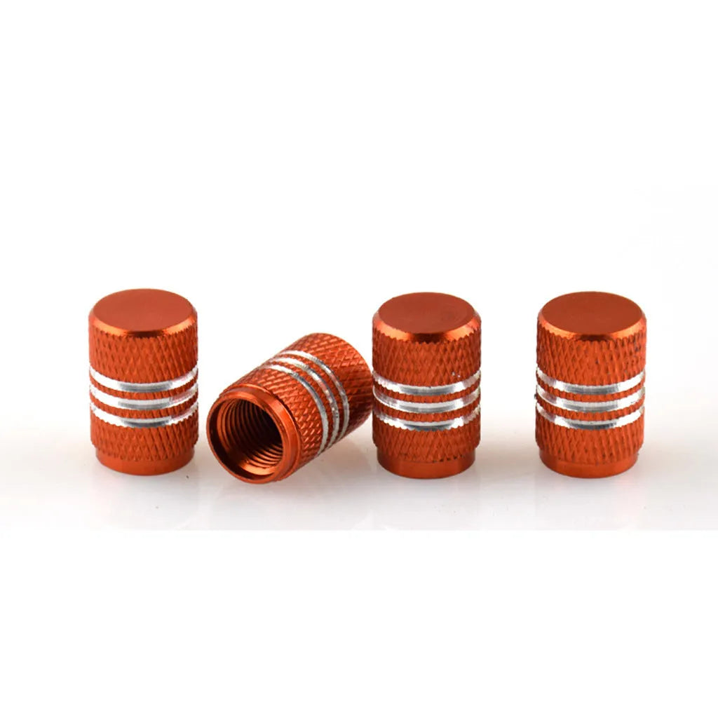Set of stainless steel car tyre valve caps in assorted colours: black, red, blue, gold, silver, green, purple, sky blue, grey, orange.
