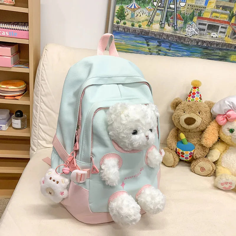 Nylon school backpack in macaron colours with curved shoulder straps and 20-35L capacity