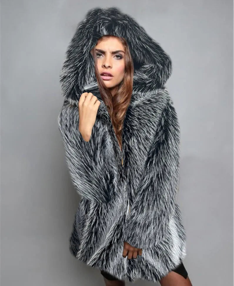 Women's loose mid-length artificial fur coat in silver grey colour showing regular sleeves and midi cut