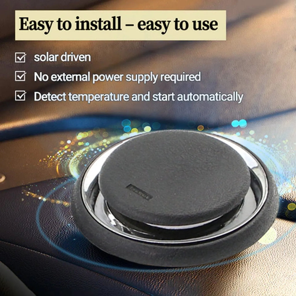 Black portable car deicing instrument for melting snow on vehicle windscreens.
