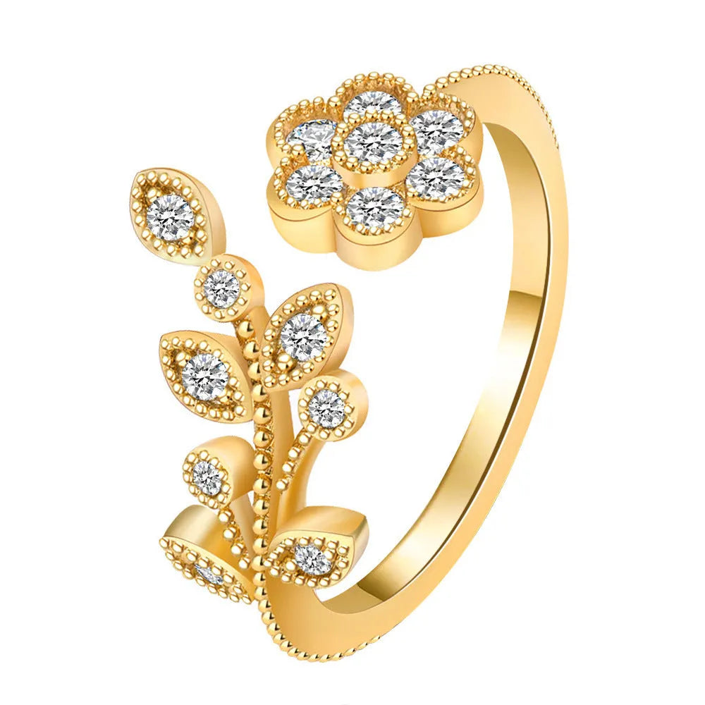 Gold diamond treated copper open ring with flower and leaf design for women