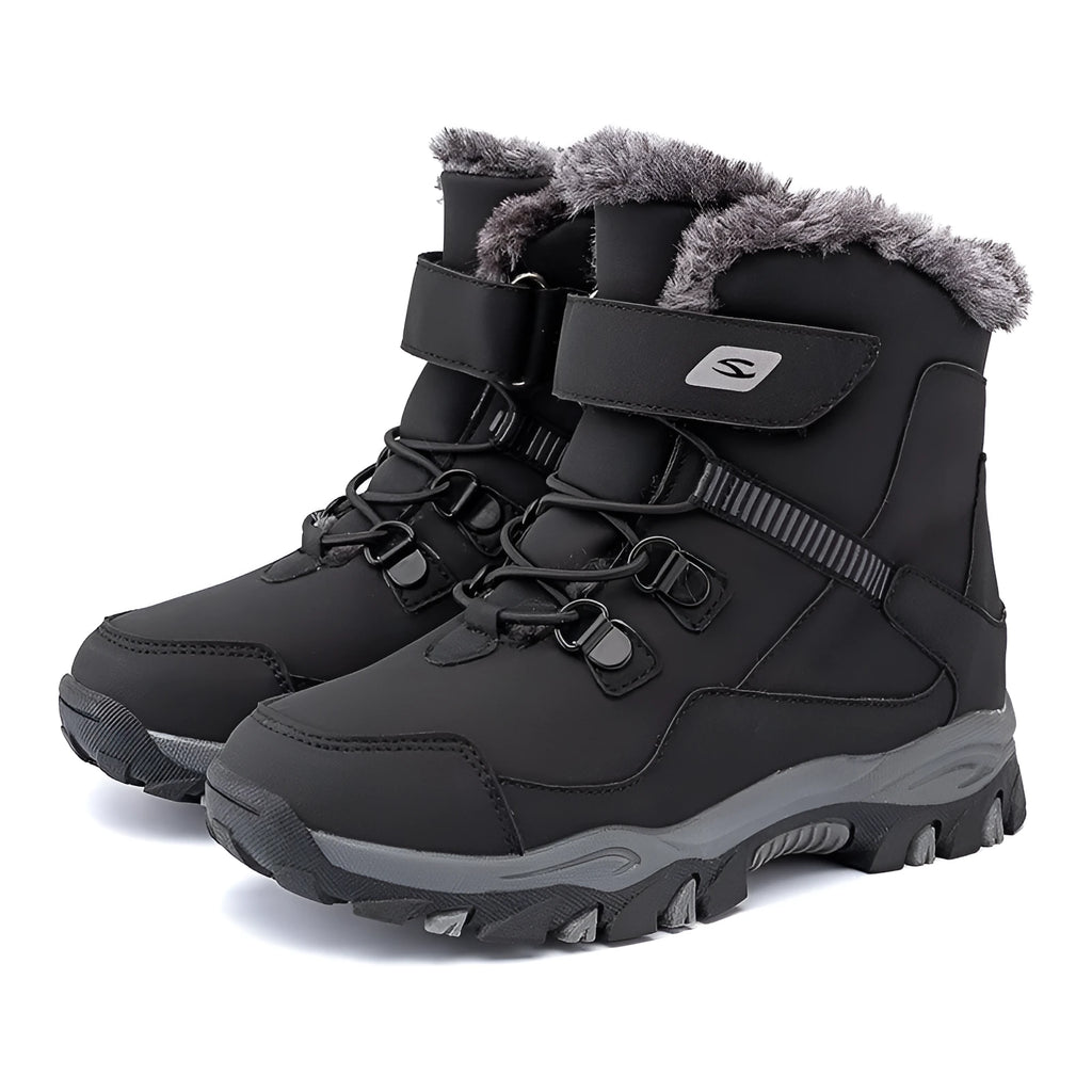 Hobby Bear black children's martin boots with a velcro strap and buckle on a waterproof artificial leather upper.