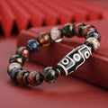 Chinese-style five-colour lucky snake bead bracelet made from coloured glaze, showing auspicious patterns.