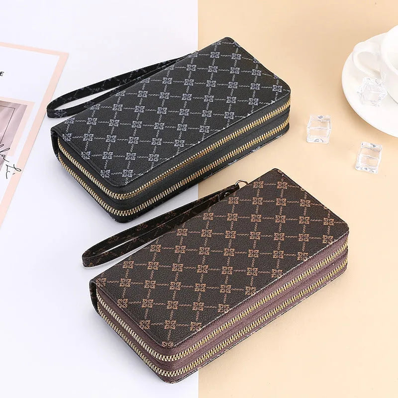 Long black PU leather wallet clutch with retro styling, open to show mobile phone compartment and coin purse sections