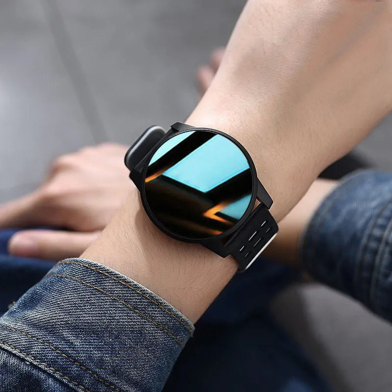 Black smart watch with sport rubber strap and 1.3-inch screen showing step count data.