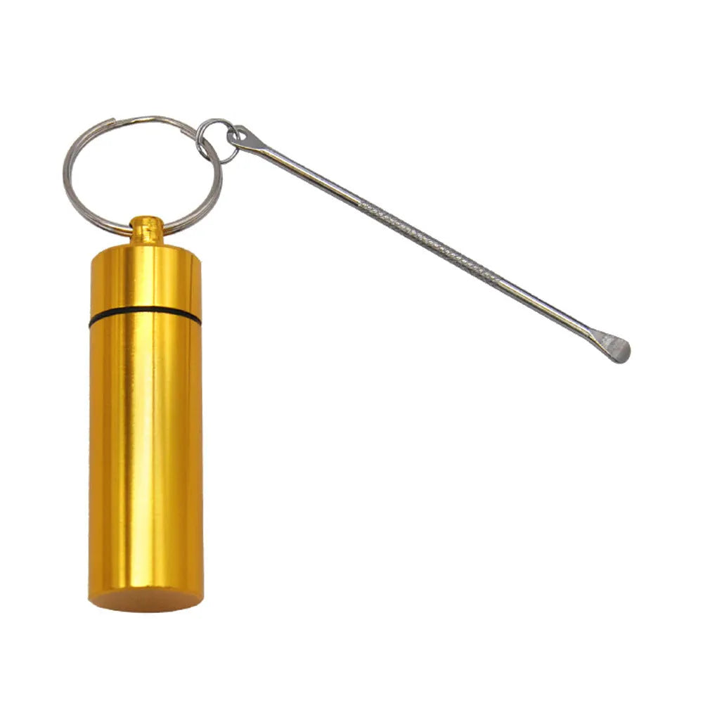 Blue aluminium portable medicine bottle with attached spoon and keychain for medication organisation