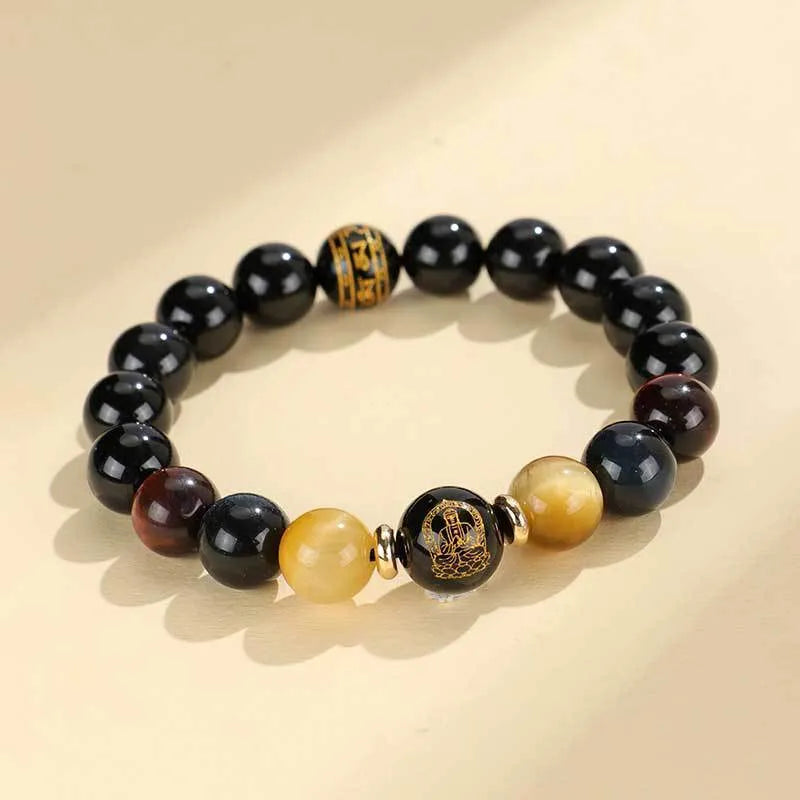 Handmade black agate beaded bracelet with Buddhist carving and tiger eye gemstones